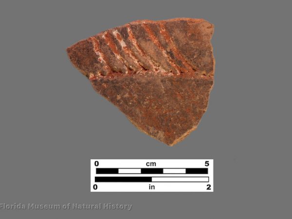 1 sherd with angled linear incisions from rim