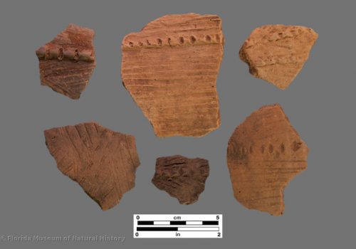 6 pottery sherds with brushed/incised exterior surfaces