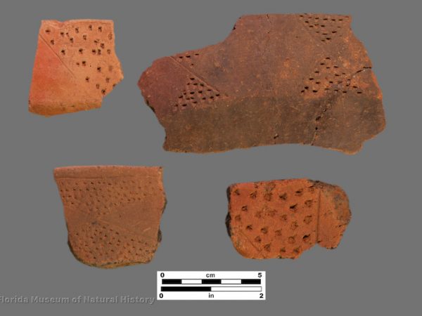 4 sherds of pottery with triangular areas of punctation