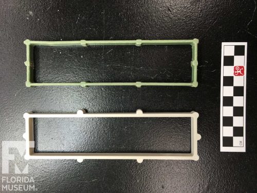 Two open rectangles of plastic