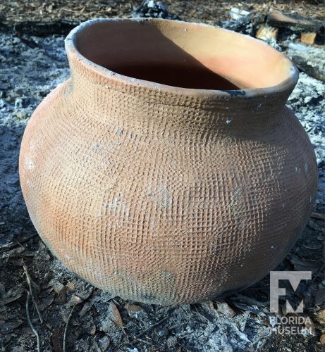 A pottery jar on the ground