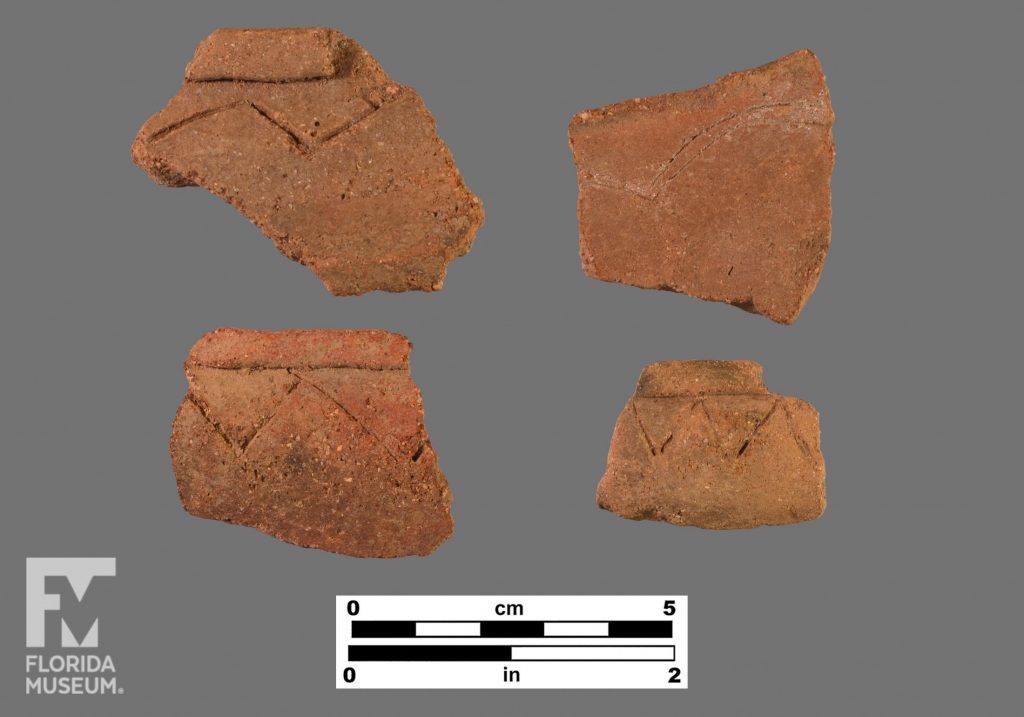 Four sherds with folded rims and incised decoration. Three are chevron and one is arched.