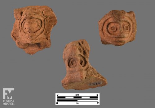 Formal artifact photos of three adorno face effigies