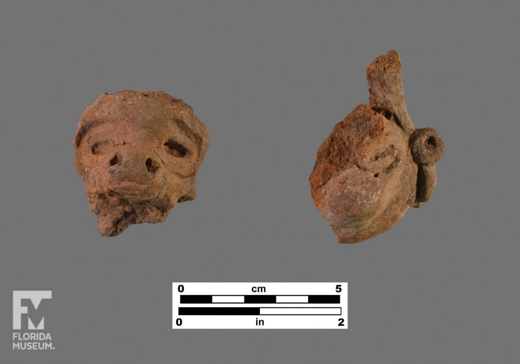 Formal artifact photo of two Chicoid adornos. The one on the left has a wide snout or nose and the one on the right may be wearing a headress.