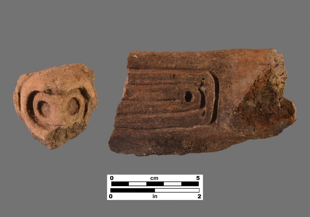 Formal artifact photo of two sherds. The right on the left is a light colored adorno and on the right is a darker sherd with square incising and punctation.