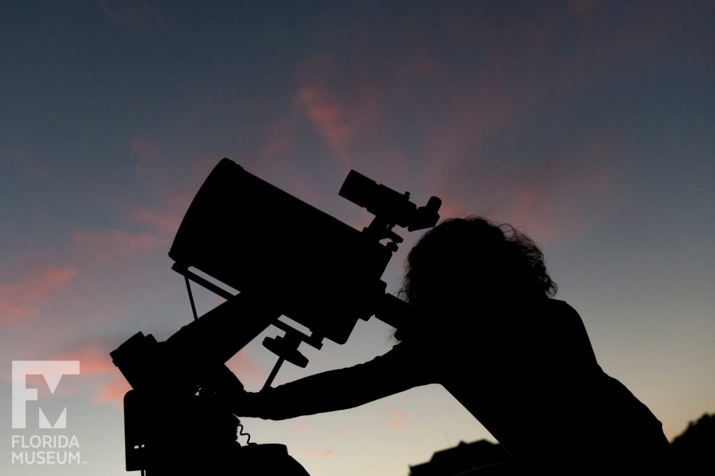 looking through telescope