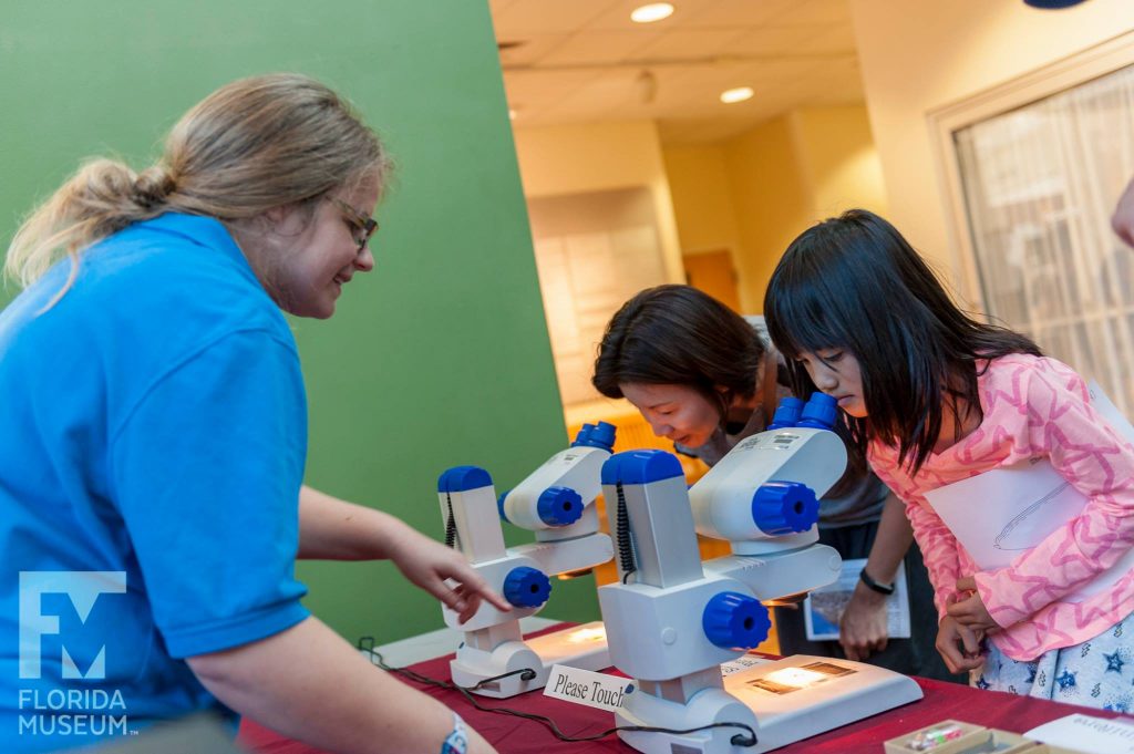 visitors with microscopes