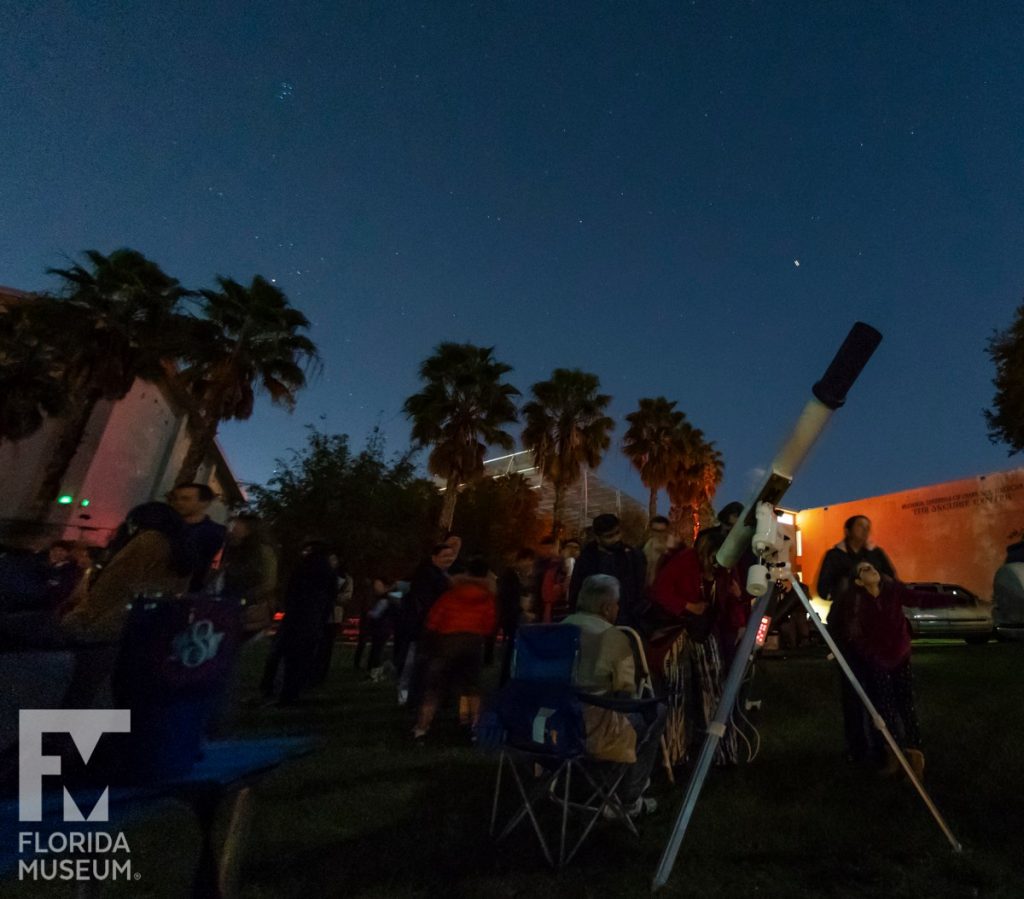 telescopes outside at night