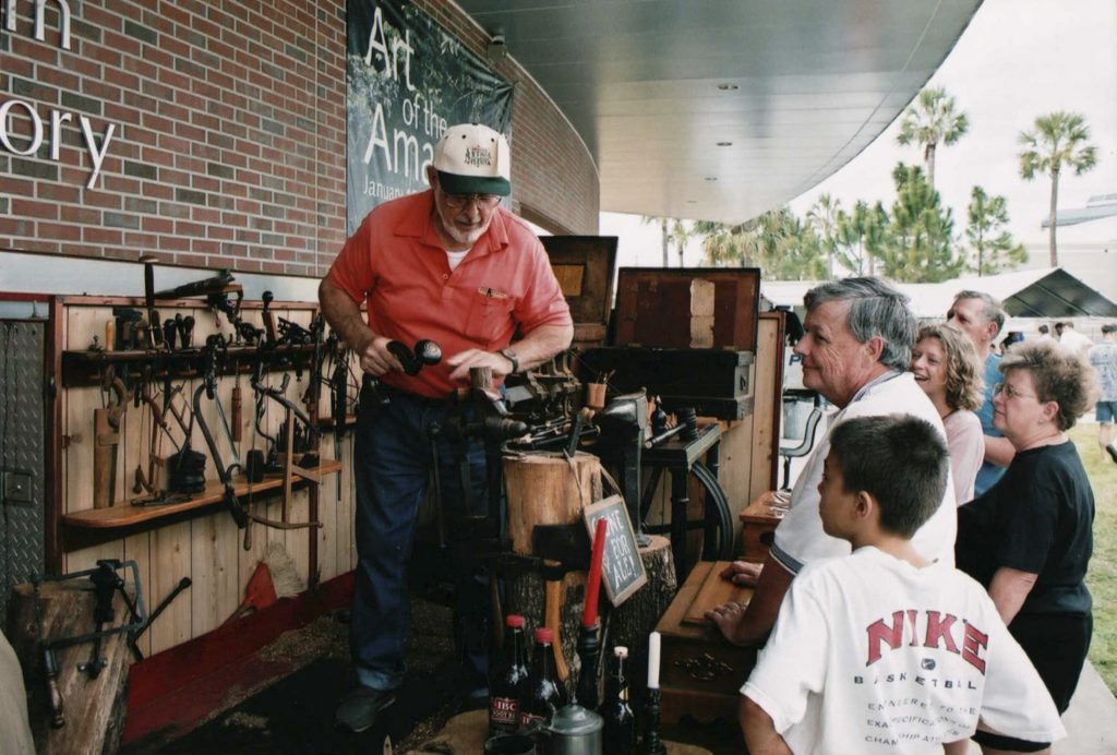 Robert Sherman with antique tools.