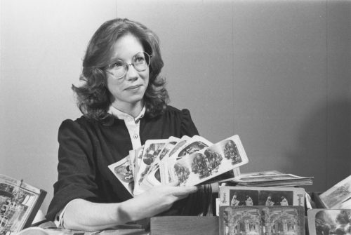 Dorothy Truhon with antique stereographs.