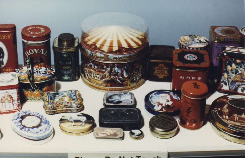 a photograph of a tin box collection.