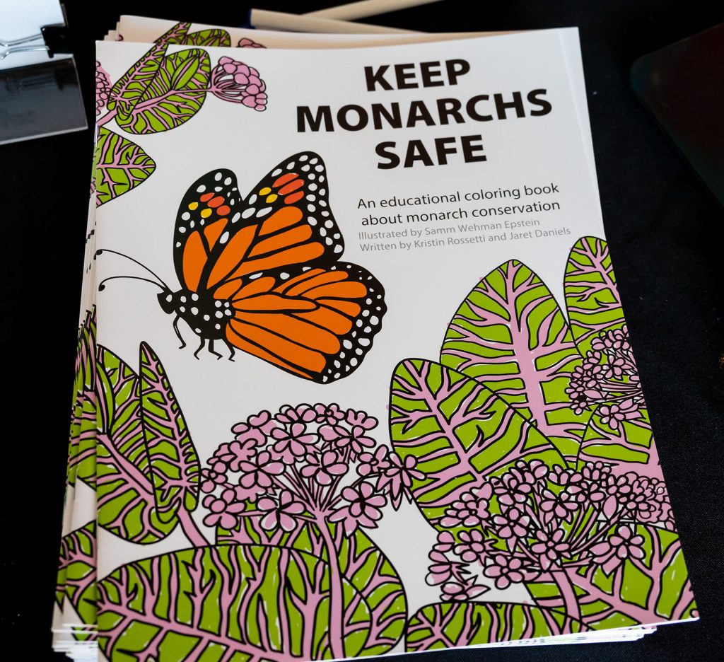 stack of the coloring book "Keep Monarchs Safe"