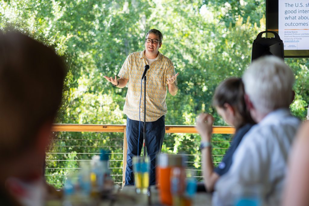 man speaking into a microphone