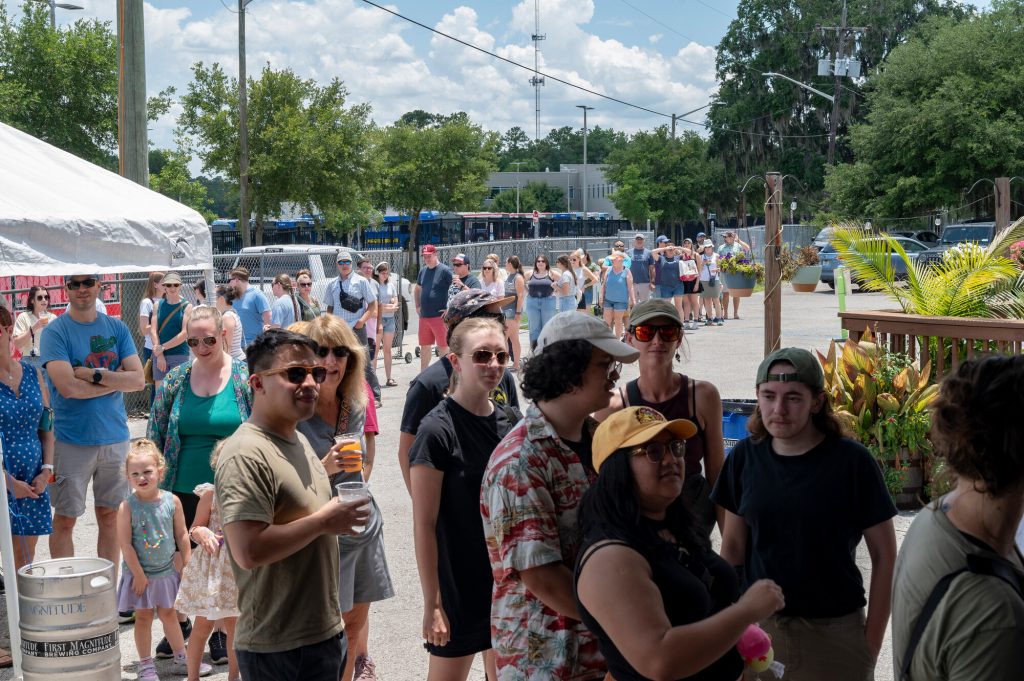 people waiting in line to receive a free plant from Daniels lab