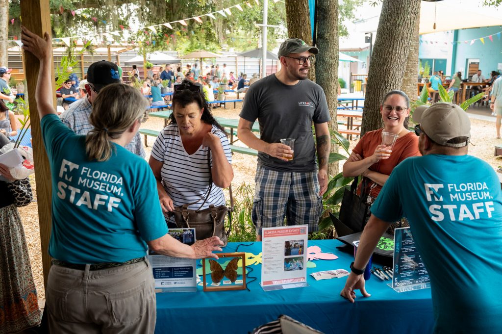 The Museum education team speaking with people at Pollinator Palooza