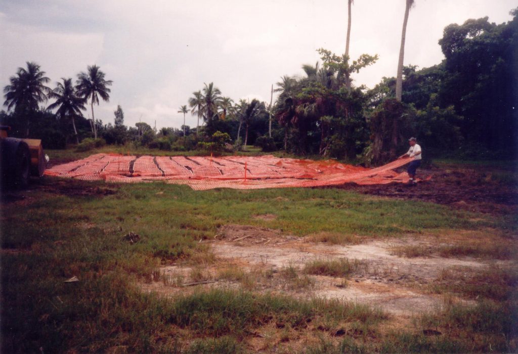 orange plastic sheeting covering the ground