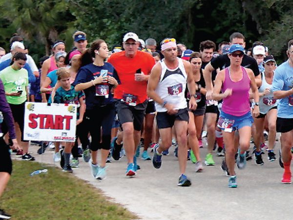 Runners at the start of the Calusa 5K