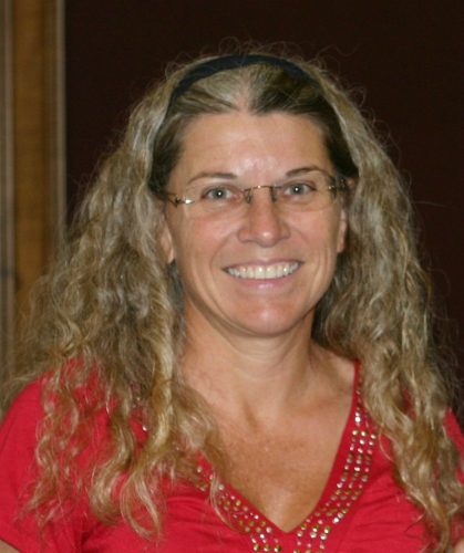 portrait photo of researcher smiling into camera