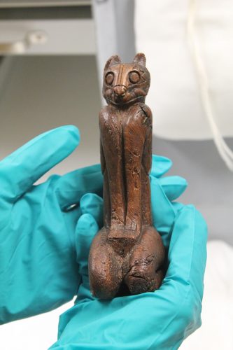 wooden carving on a cat