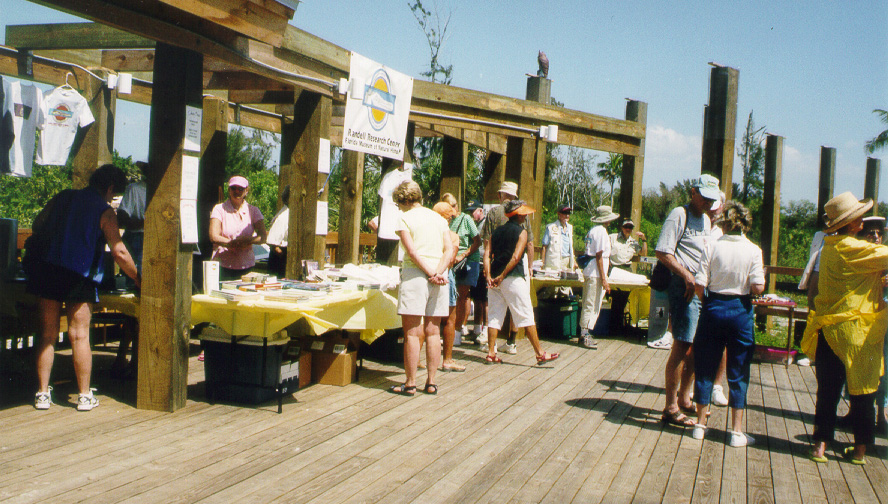 people and display tables on the RRC visitor center deck