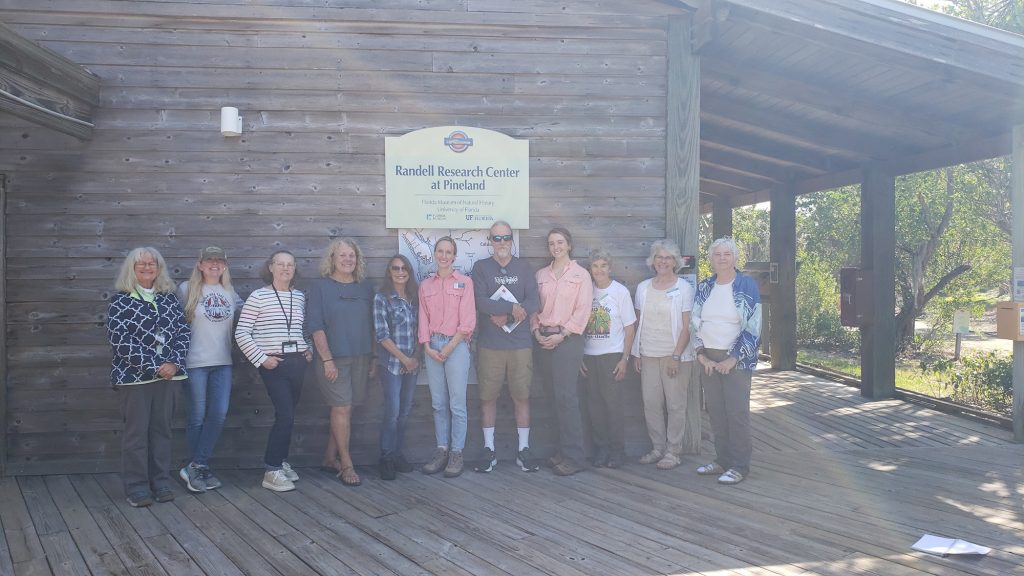 group of people posing for a group photo