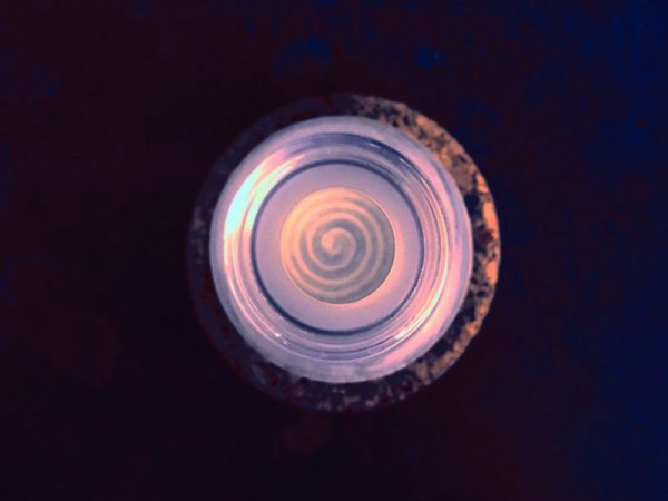 solvent swirled from processing