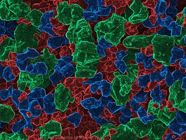 Scanning Electron Microscopy of Fractured Alumina by Cody Kunka, Matthew DeVries: Due to its versatility and numerous forms, aluminum oxide has many names, including ruby, sapphire, and alumina. Industry employs polycrystalline forms in applications requiring extreme resistance to abrasion, impact, and heat. To test the mechanical response of one of the first 3D-printed samples, we performed high-load indentation and imaged the fracture pattern with scanning electron microscopy (SEM). We then applied a Sobel algorithm for edge detection and manually colored fragments by size (from about 1 to 5 microns). Knowing this size distribution facilitates models of deformation and offers comparison to other advanced ceramics.