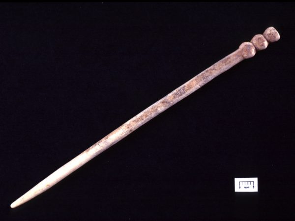 A bone pin manufactured from a large mammal bone (possibly white-tailed deer).
