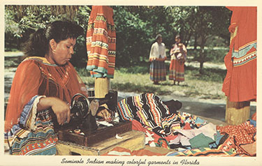 Figure 1: Post card of a Seminole woman sewing patchwork (2012-35-7). Donated by William Keegan.