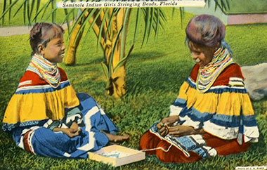 Figure 3: Post card of two Seminole girls stringing beads (2013-6-61). Donated by Anne Reynolds.