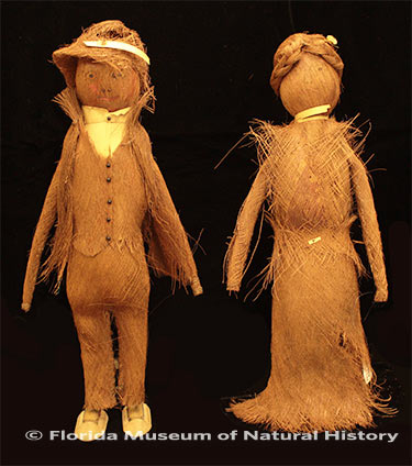 Figure 15: Pair of all-palmetto fiber dolls. Photo credit: Gypsy Price (2013-31-2/2013-31-3). Palmetto fiber, metal, wood. Circa 1930-1940, 32cm/32.07cm. Donated by Lynn Johnson .