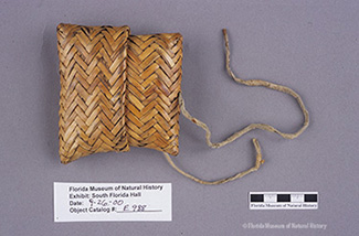 Figure 2: Envelope basket, Seminole, split palmetto, buckskin, ca. 1920s-1950s, 10 x 9 x 3 cm. Collected by John M. Goggin (84-16-E988).