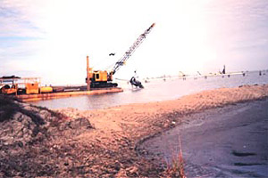 Dredging activity. Photo courtesy Dr. Terry McTigue, NOAA