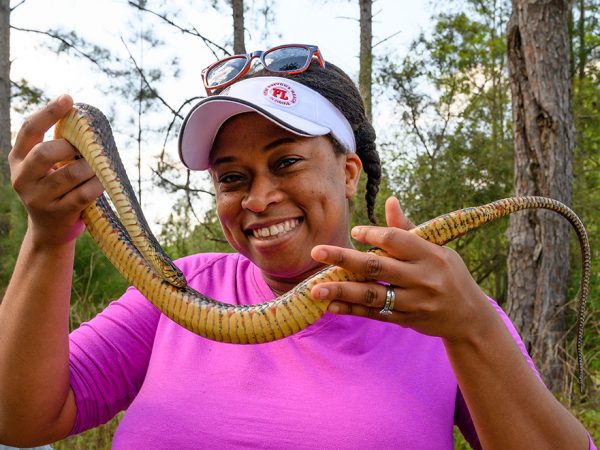 Adania Flemming, holding a snake