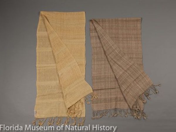 The scarf to the left is composed of silk of Cricula trifenestrata. This wild silk is collected and processed in Yogyakarta, Java, Indonesia. The scarf to the right is composed of fagara silk (Attacus atlas). This scarf is also from Yogyakarta, Java, Indonesia and handspun and handwoven.