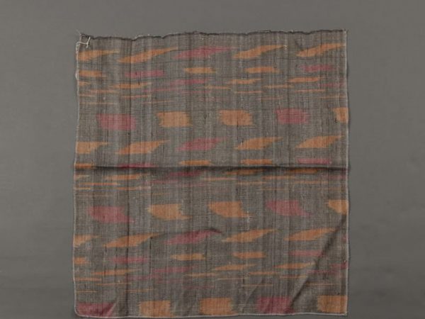 Piece of fabric of 100% tropical silk (Antheraea paphia = A. mylitta). The silk is natural colored and was handspun and handwoven. It was made in the early 20th century, almost certainly in what is now Odisha (=Orissa) or Andhra Pradesh, where ikat cloth was and is commonly woven. Warps: mulberry silk (Bombyx mori) Wefts: tasar silk (Antheraea paphia)