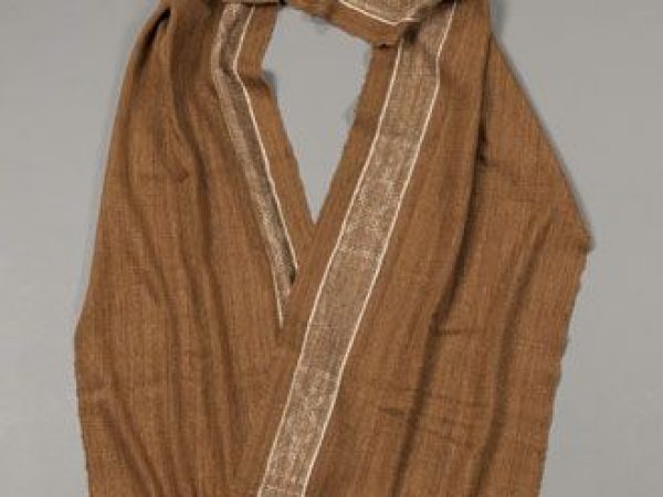 Landibe silk shawl from Madagascar. Handspun yarn and handwoven by women in village of Soatanana, in highland region of Ambositra. Wild silk from cocoons of Borocera (Lasiocampidae) on tapia trees, and natural dyes.