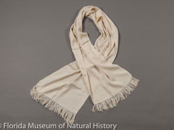 Scarf of 100% eri silk (Samia ricini) handwoven in Uttarakhand, India. This silk is the natural beige color, and the weave is a mock leno pattern. The weave was designed by Kiran Purohit- Badola. Measures 33 cm X 178 cm.