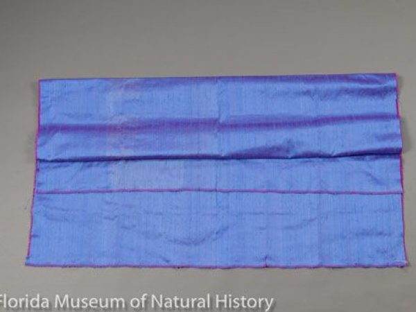 Fabric of mulberry silk (Bombyx mori). This particular variety is douppioni, with red warp and blue weft threads.