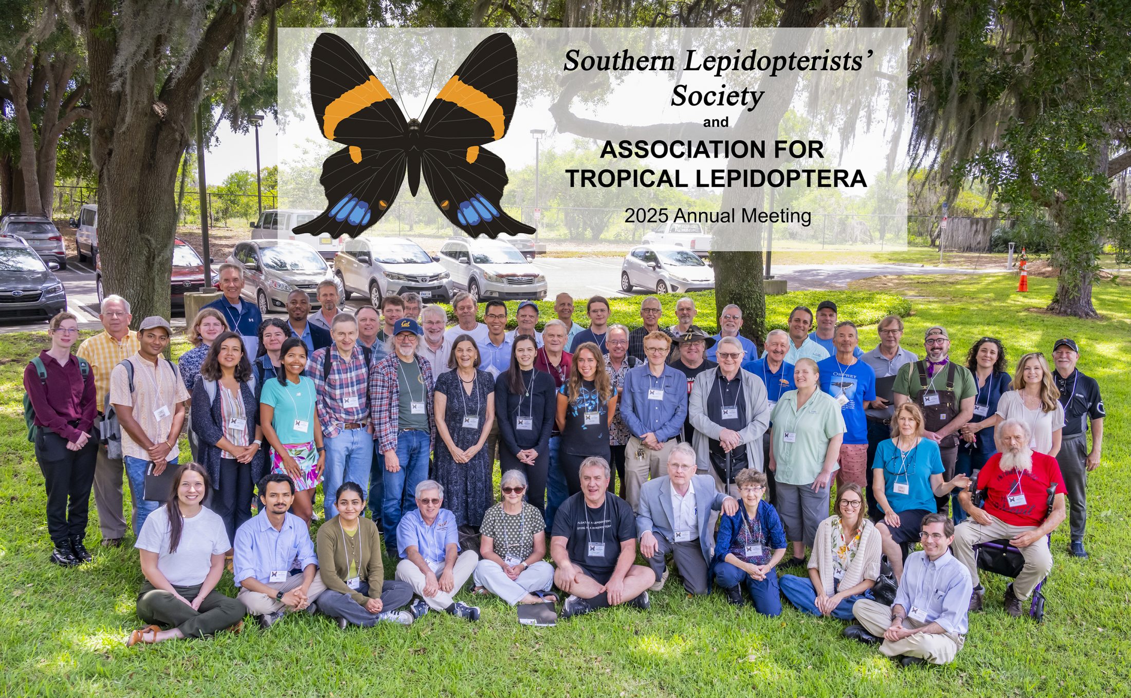 Group picture outside under oak trees.