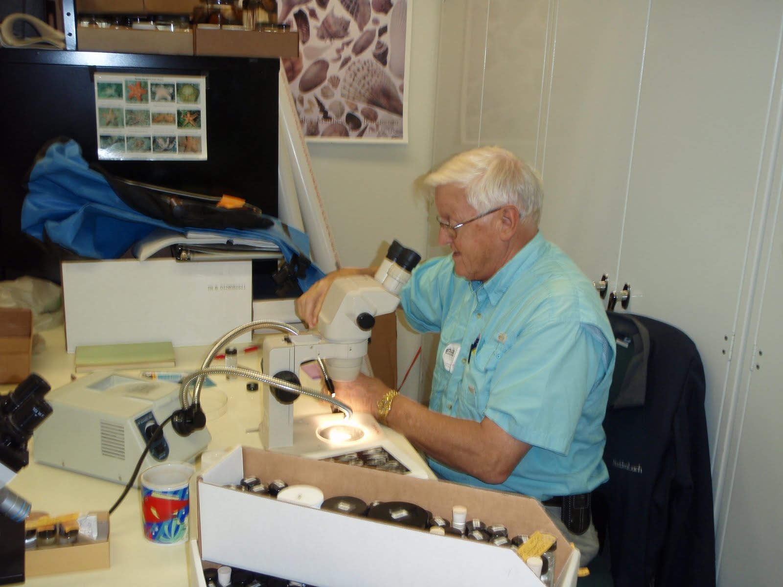 Harry Lee identifying snails