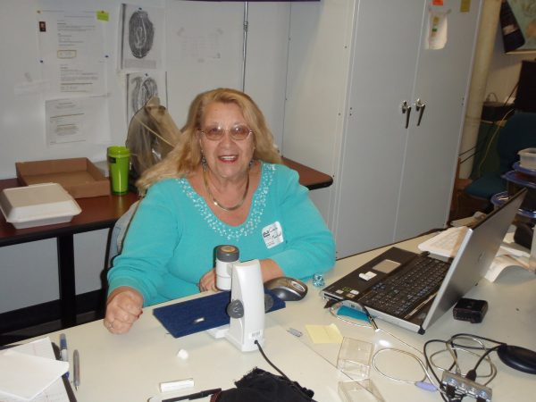 Carole with her computer and equipment