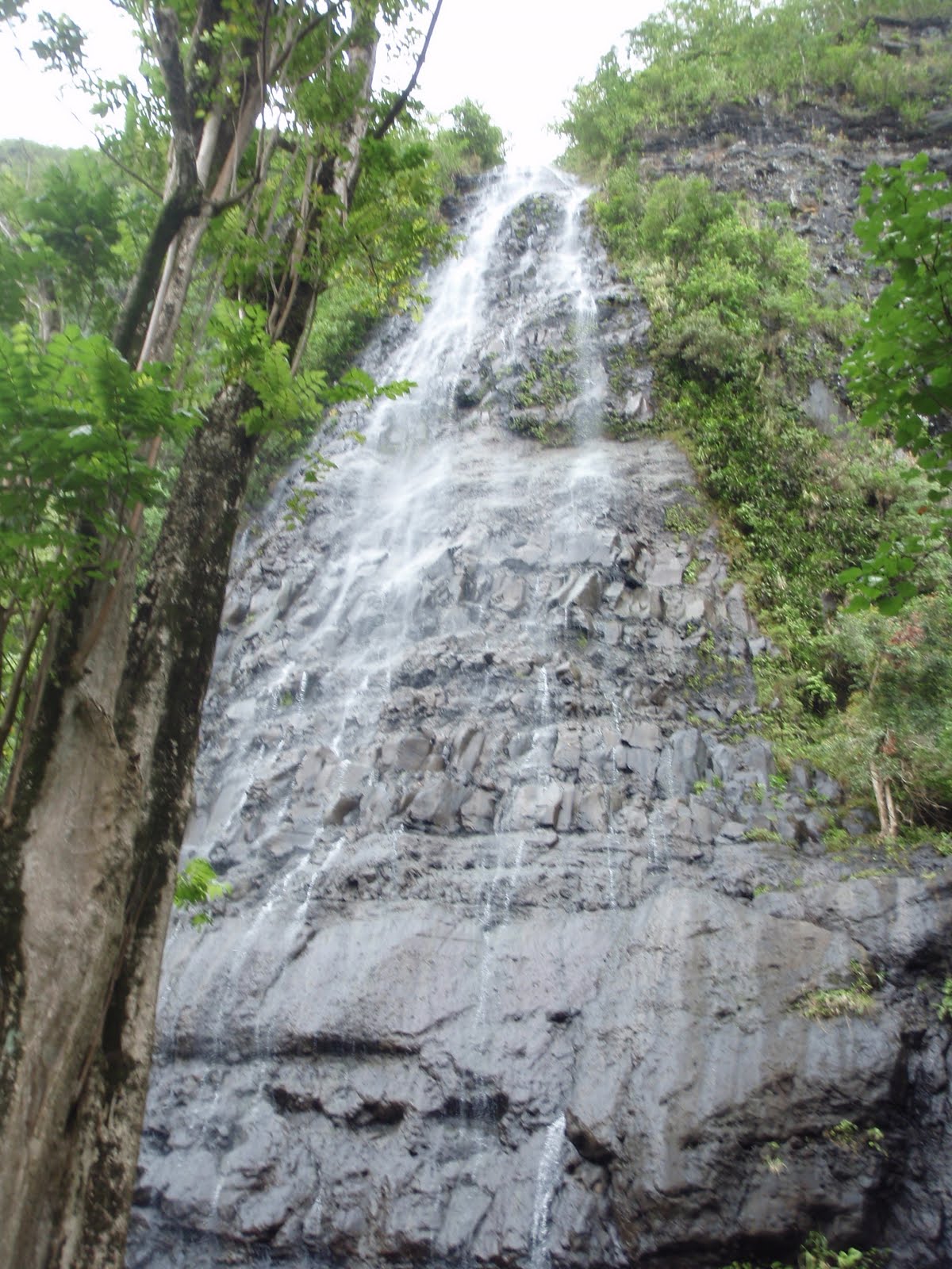 waterfall cascading down rock
