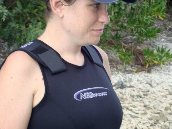 Sarah in hat and wetsuit, ready to work