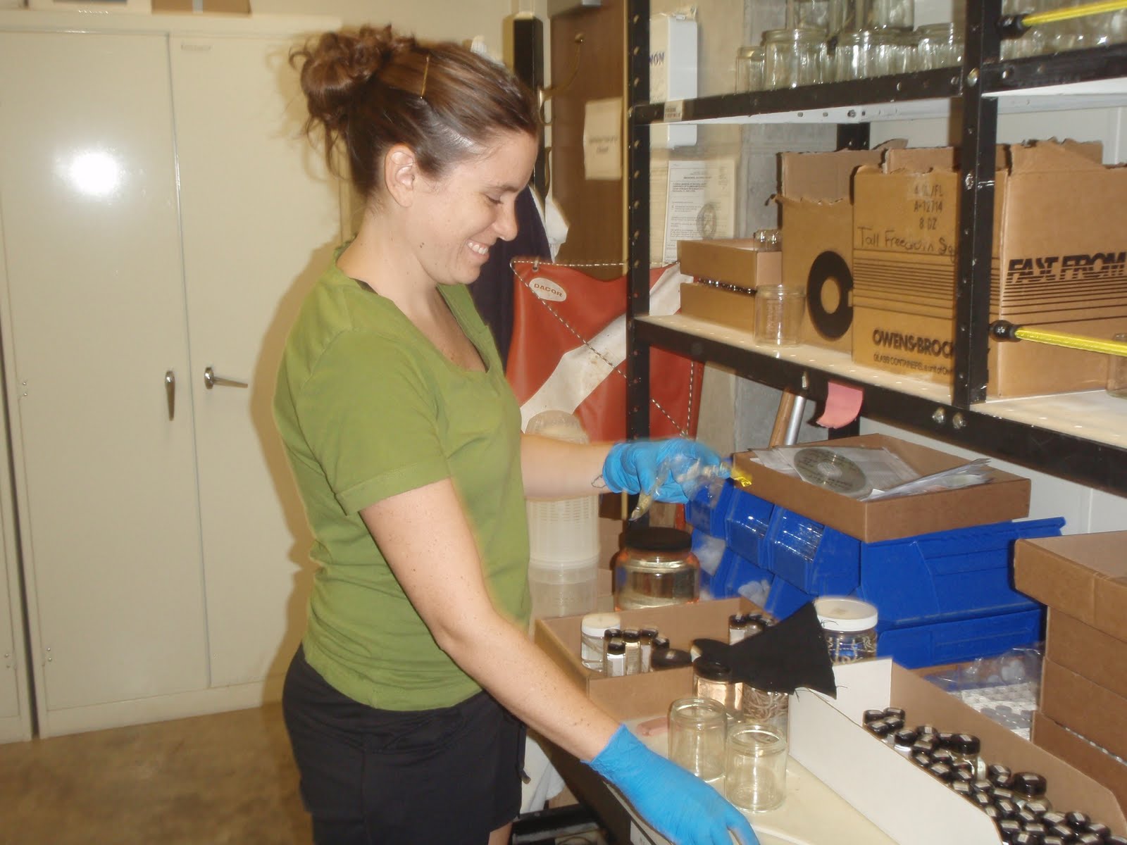 Sarah unpacking specimens in the lab