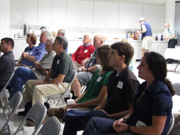 audience starting raptly towards the speaker (not pictured)