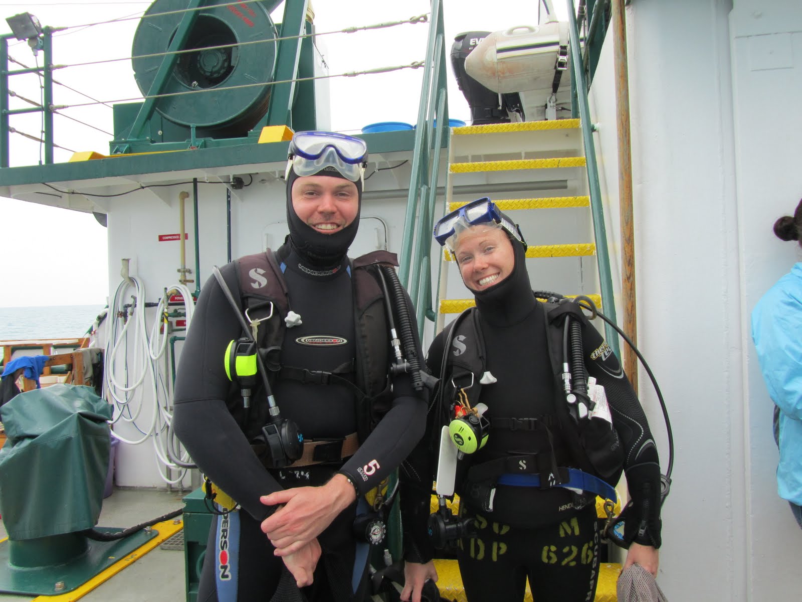 Brendan and Anna in dive gear pre-dive