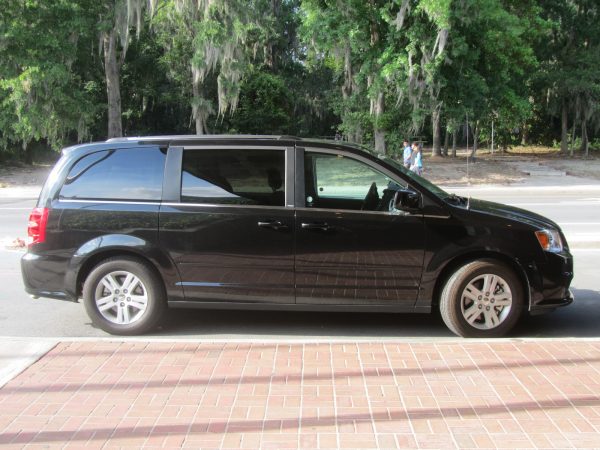 black minivan parked outside Dickinson Hall