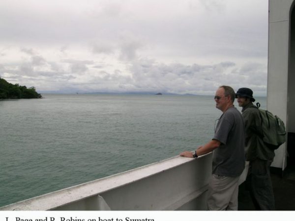 people looking off side of ship