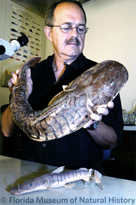 Larry Page holding catfish